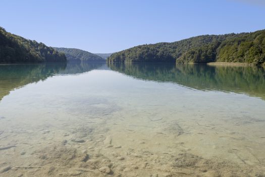 Crystal-clear water of a lake in the Plitvice Lakes National Park in Croatia.