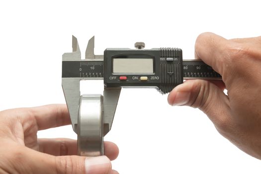 Man using vernier caliper Measurements of the Bearing, on white background