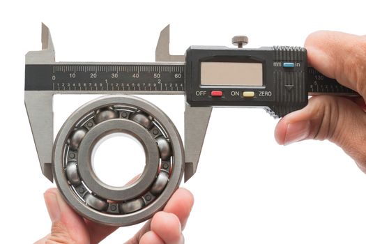 Man using vernier caliper Measurements of the Bearing, on white background