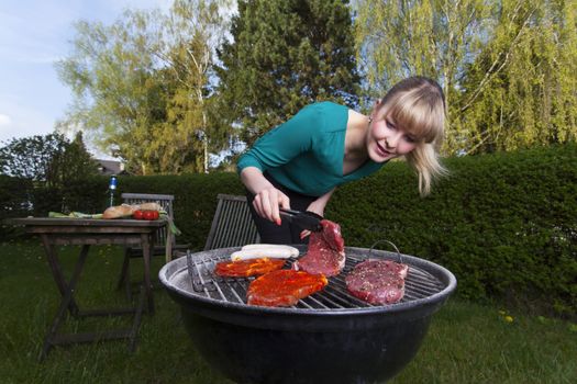 woman and a barbecue