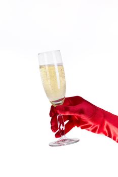 Female hand in red opera glove holding champagne glass, isolated on white background 