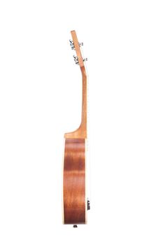 Side view of classic ukulele Hawaiian guitar, isolated on white background 