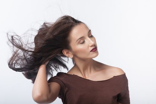 Portrait of a woman on white background