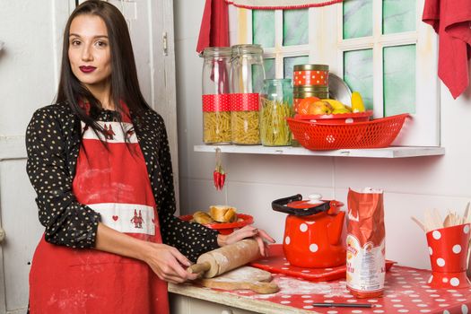 Housewife in the kitchen. Positive concept, closeup.