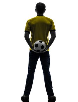 one  man holding soccer football silhouette rear view back in silhouette on white background