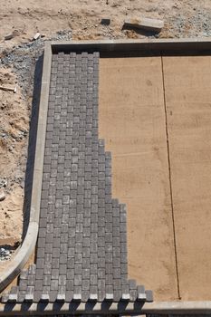 making pavement in construction site from above