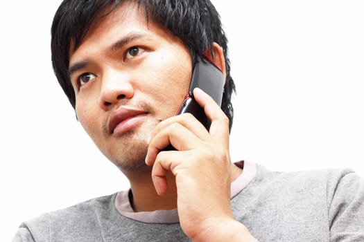 man talks at mobile phone