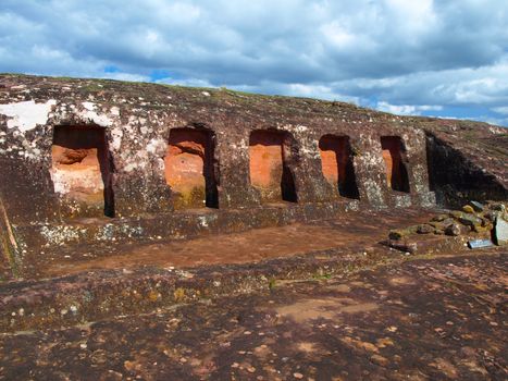 Five niches in the rock in archeological site El fuerte of Samaipata (Bolivia)