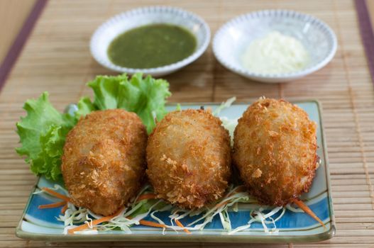 Three croquettes with sauces Japanese style 