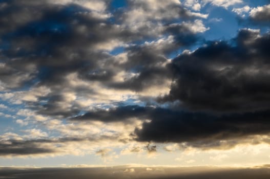 Cloudscape, Colored Clouds at Sunset near the Ocean