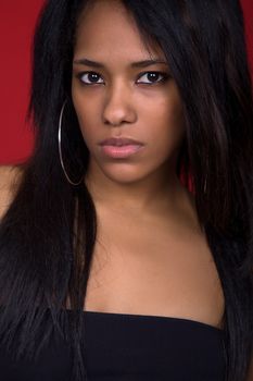 young casual woman close up portrait, studio shot