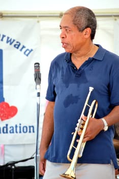 African american jazz musician performing in concert.