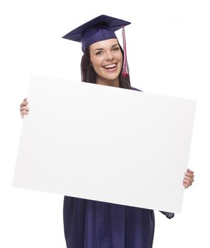 Happy Mixed Race Female Graduate in Cap and Gown Holding Blank Sign Isolated on White.