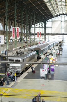Paris, FRANCE - OCTOBER 21: High angle shot of platform in Gare du Nord with old train stationed. October 21, 2013 in Paris.