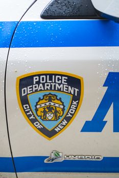 NEW YORK, US - NOVEMBER 22: Detail of door of New York Police car showing crest. November 22, 2013 in New York.