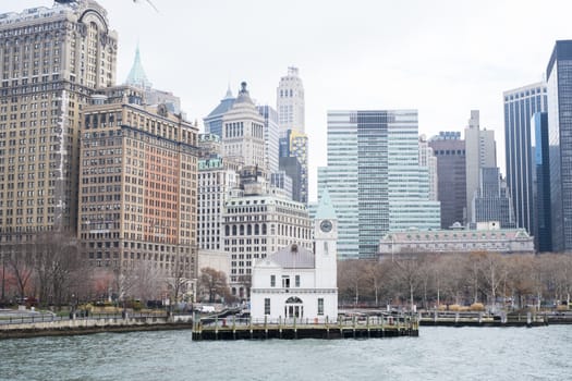 NEW YORK, US - NOVEMBER 22: Small rustic pier with Manhattan skyline in the background. November 22, 2013 in New York.