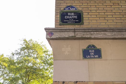 Street corner in Paris, Rue Chappe with Rue de La Fa Mi