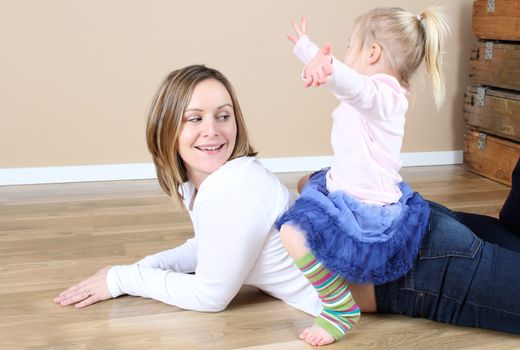 Mother and toddler daughter spending time together