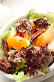 Caramel walnut and orange salad with dressing