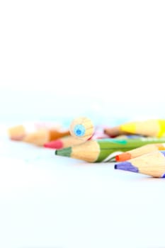 Bunch of colouring pencils on a white table