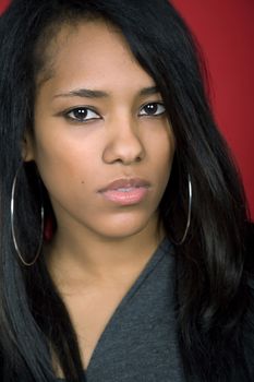 young casual woman close up portrait, studio shot