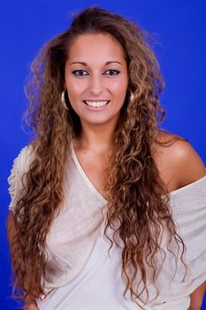 young beautiful woman, on a blue background