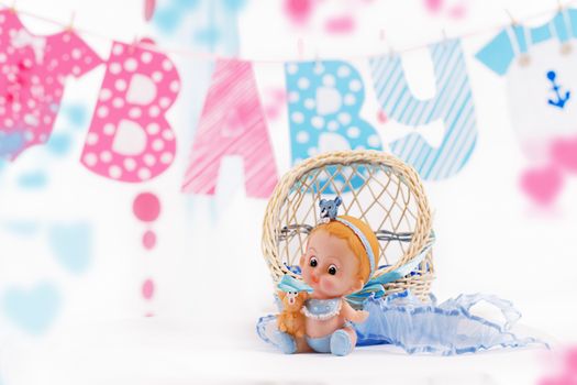 Cute baby elements with word baby and blue toy over white