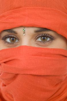 young woman with a veil, close up portrait, studio picture