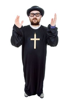 young man dressed as priest, full length, isolated on white