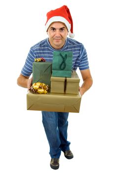 young man with santa hat holding a few gifts, isolated