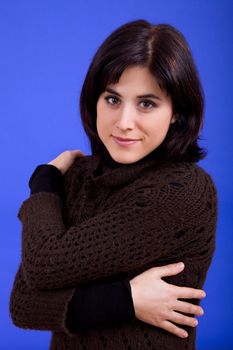 young beautiful woman, on a blue background