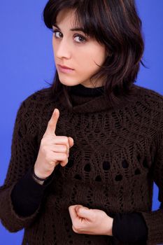 young beautiful woman, on a blue background