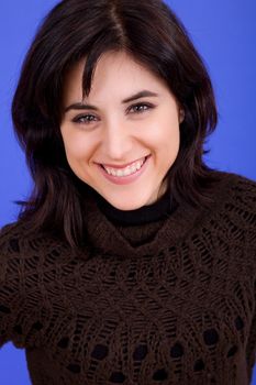 young beautiful woman, on a blue background