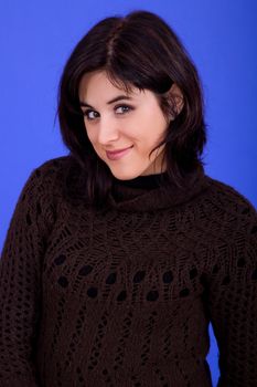 young beautiful woman, on a blue background