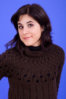 young beautiful woman, on a blue background