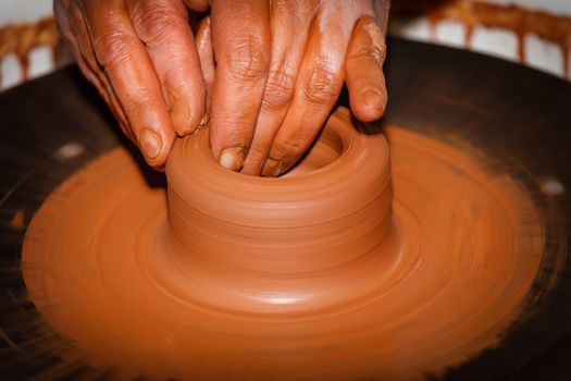 The process of creating pottery by hand