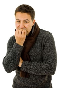 studio picture of a young man dressed for winter with cold