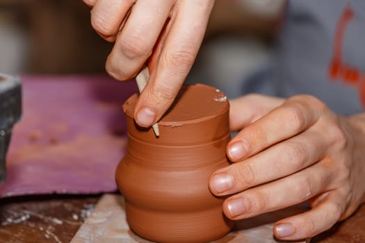 The process of creating pottery by hand