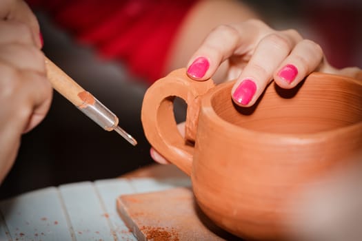 The process of creating pottery by hand