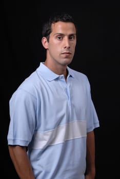 young casual man isolated on black background