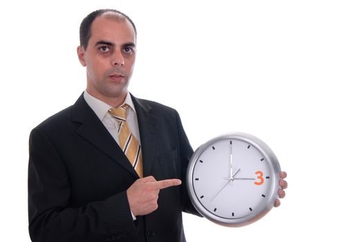 A handsome business man holding a clock