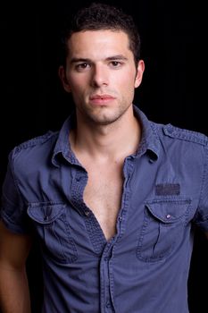 young man portrait, on a black background