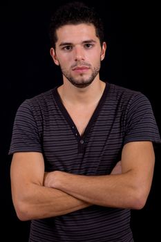 young man portrait, on a black background