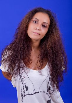 young beautiful woman, on a blue background