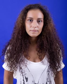 young beautiful woman, on a blue background