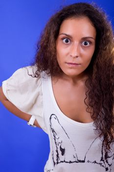 young beautiful woman, on a blue background