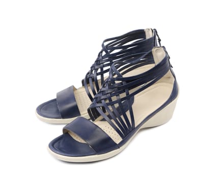 Wicker black leather sandals. Isolated on a white background.