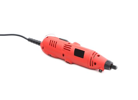 Close up of mini red drill. Isolated on a white background.