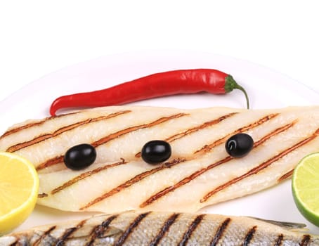 Grilled seabass with pangasius fillet. Whole background.