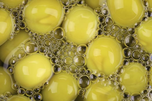 Close up of olive in water. Whole background.